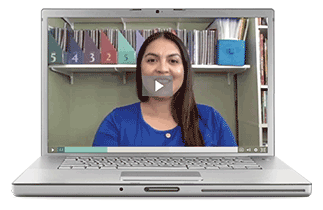 A laptop with lesson video and associated print resources.